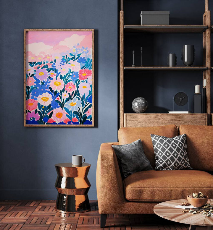 Wild Flower Field By Treechild Botanical Art Prints in Oak Wood Plain Frame placed on a Blue Colored Wall near a Brown Sofa in the Living Room