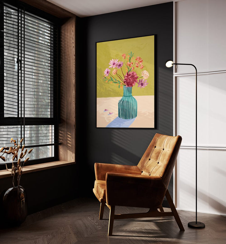 Wilderflowers By Goed Blauw Botanical Art Prints in Black Plain Frame placed on a Dark Grey Colored Wall near a Brown Sofa Chair in the Drawing Room