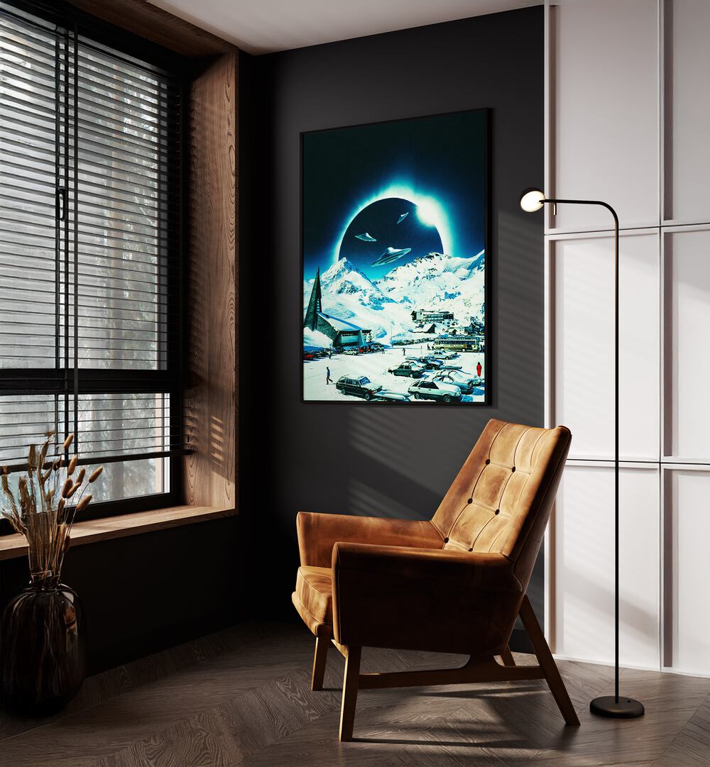 Winter Eclipse Surreal Paintings Surreal Art Prints in Black Plain Frame placed on a Dark Grey Colored Wall near a Brown Sofa Chair in the Drawing Room