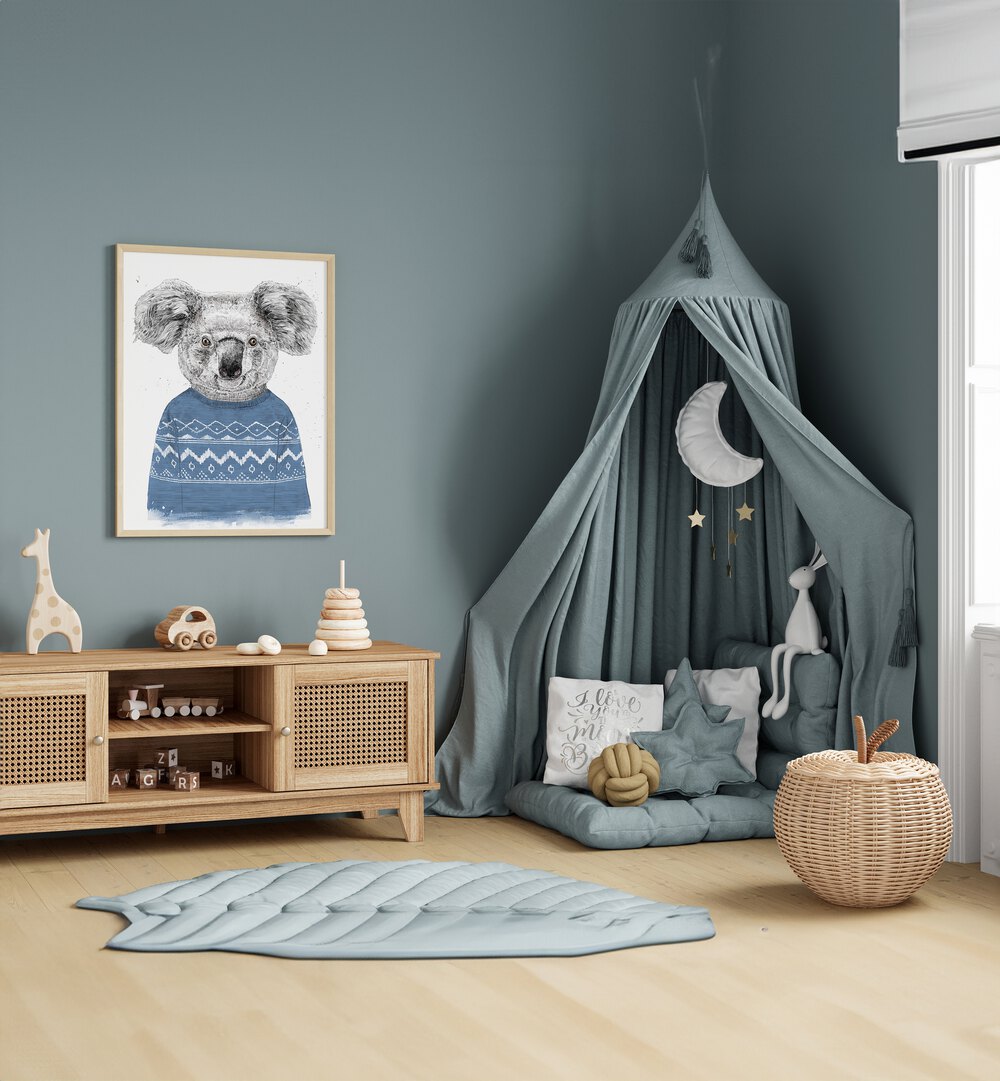 Winter Koala Blue By Balazs Solti Kids Room Art in Oak Wood Plain Frame placed on a Blue Colored Wall in the Kids Room