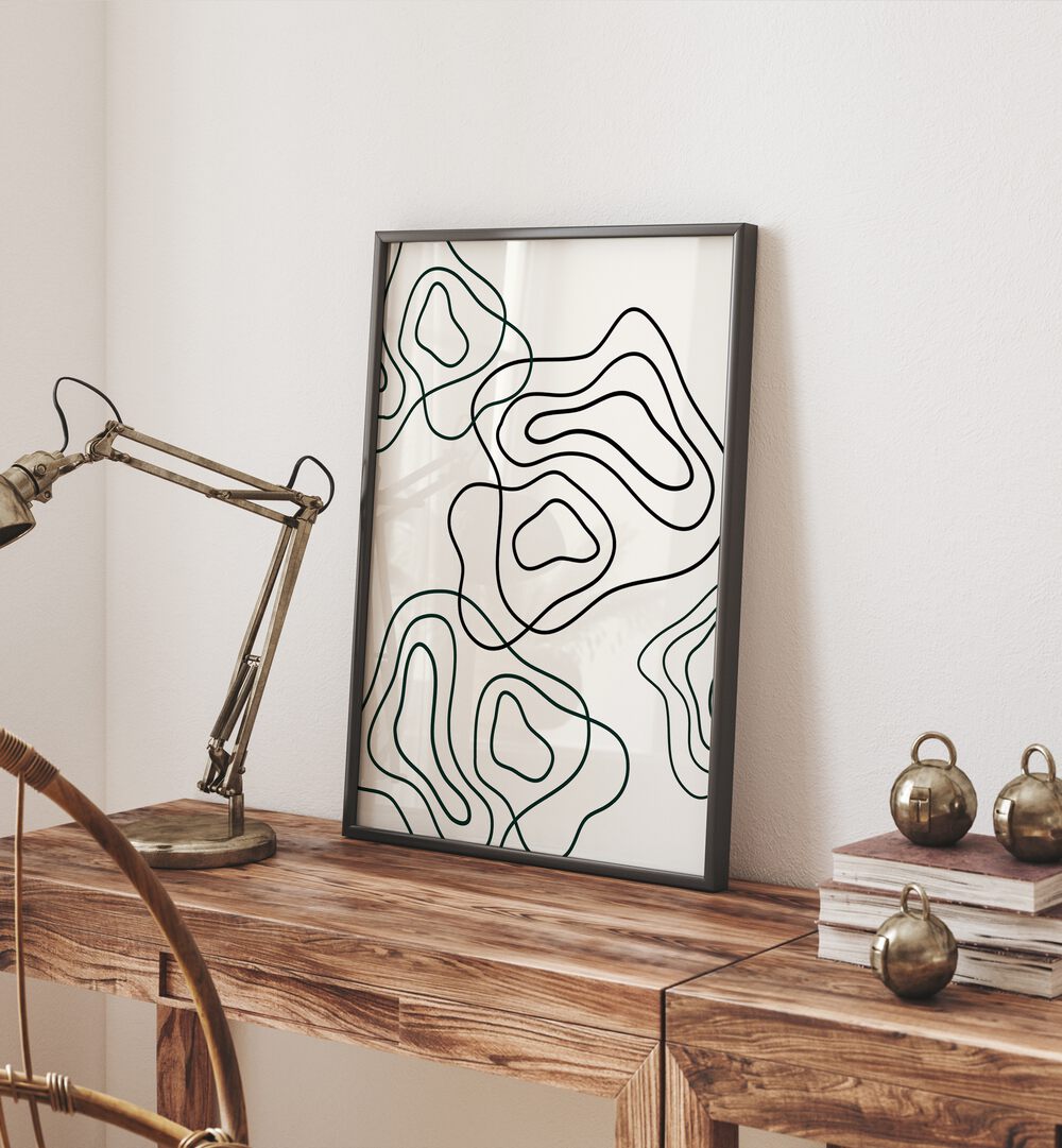 Wobbly Woo By Grishma Korjani Line Art Prints in Black Plain Frame placed on a Console Table