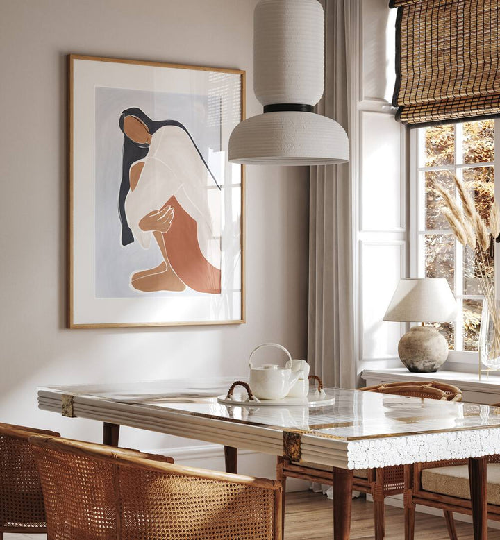 Woman Embracing Herself By Ivy Green Women Illustration Paintings in Oak Wood Frame With Mount on a white wall behind a dining table beside a window