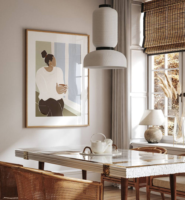 Woman Enjoying a Cup of Tea By Ivy Green Women Illustration Paintings in Oak Wood Frame With Mount on a white wall behind a dining table beside a window for dining area