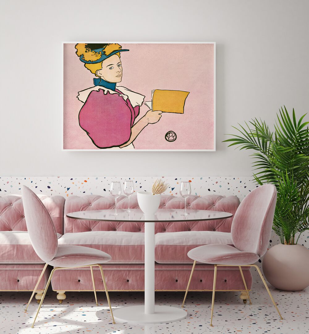 Woman Holding Book 1896 Vintage Paintings in White Plain Frame placed on a white wall behind a pink sofa for a cafe