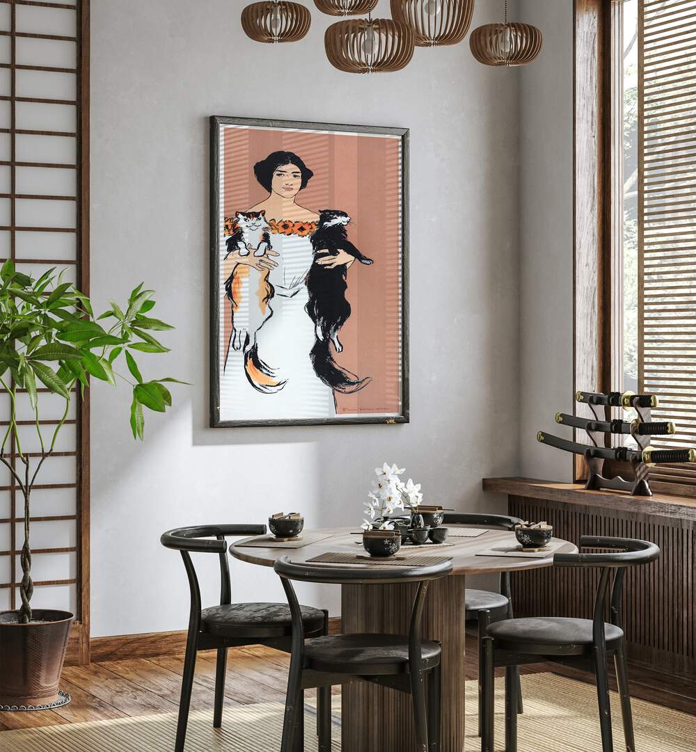 Woman Holding Cats 1898 Vintage Paintings in Black Plain Frame placed on a wall behind a dining table and beside a window for dining area