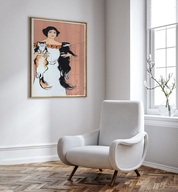 Woman Holding Cats 1898 Vintage Paintings in Oak Wood Plain Frame placed on a white wall beside a sofa and a window