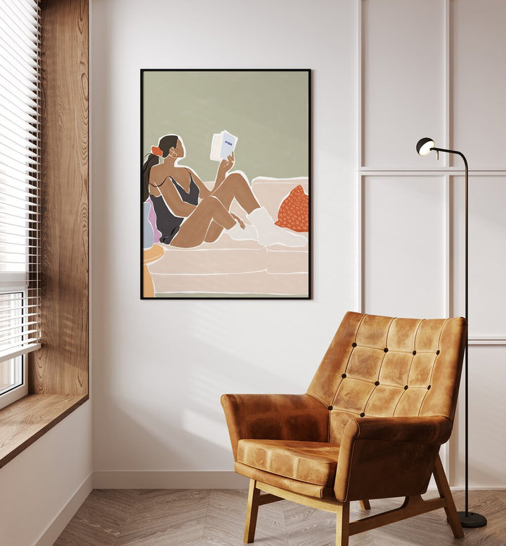 Women Reading a Book By Ivy Green Women Illustration Paintings in Black Plain Frame on a white wall beside a window