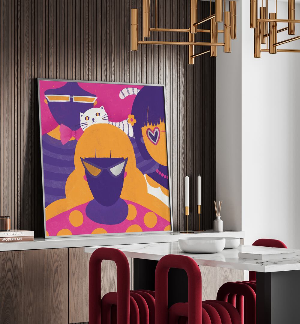 Women by Shriya Bhattacharya Art Print in Black Plain Frame on a console table behind a dining table