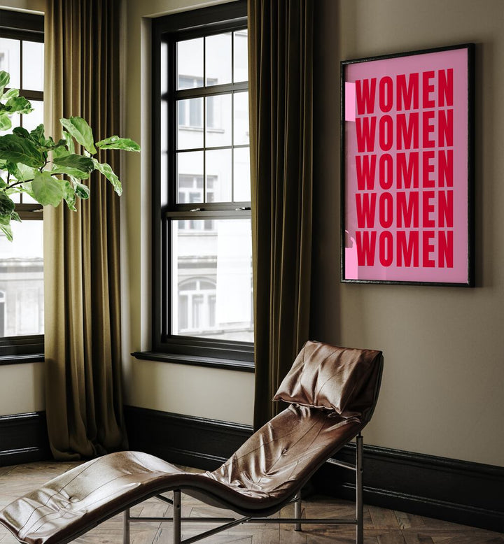 Women women by Athene Fritsch Quotes and Typography Posters in Black Plain Frame placed on a living room wall behind a chair and beside a window