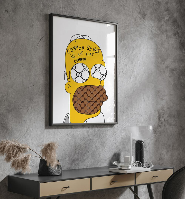 Yellow Simpson Comic Art Artwork in Black Plain Frame laced on a Textured Grey Wall Above a wooden Desk