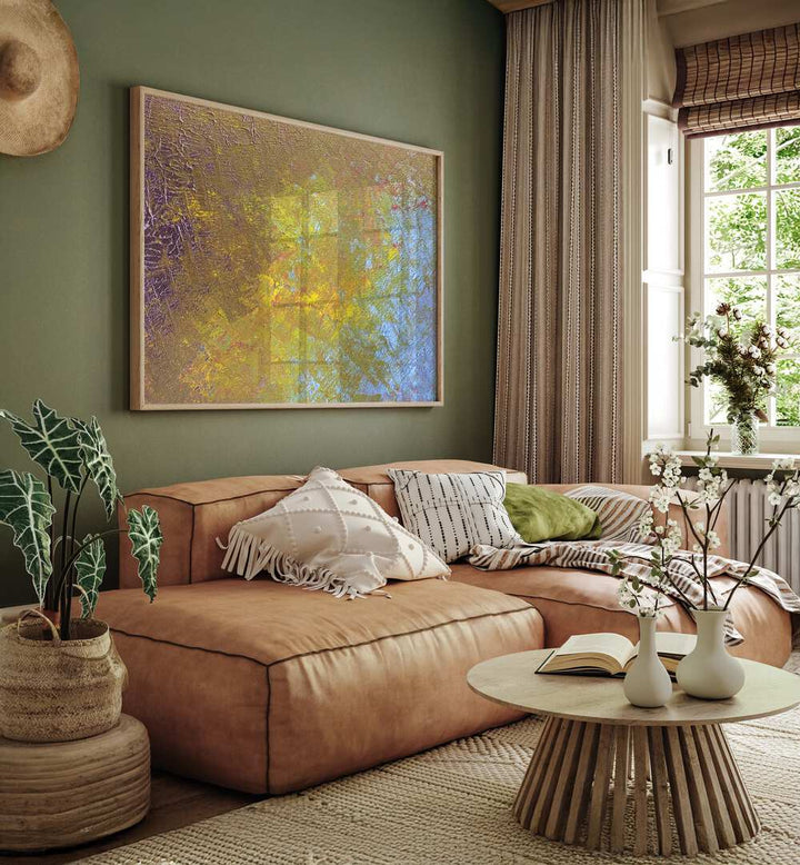 Yellow Fever Abstract Art Abstract Paintings in Oak Wood Plain Frame placed on a Green Colored Wall near a Brown Sofa in the Living Room