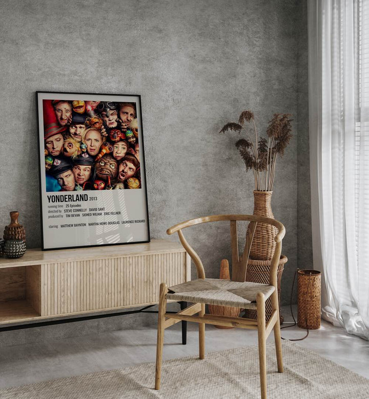 Yonderland 2013 Movie Posters in Black Plain Frame placed on a console table behind a chair