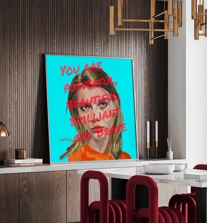 You Are Powerful By Lynnda Rakos Pop Art Paintings Pop Art Prints in Black Plain Frame on a console table behind a dining table