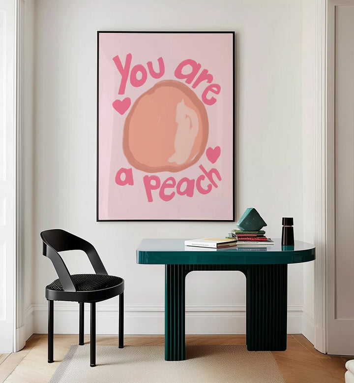 You Are a Peach by Athene Fritsch Quotes and Typography Posters in Black Plain Frame placed on a wall behind a study table