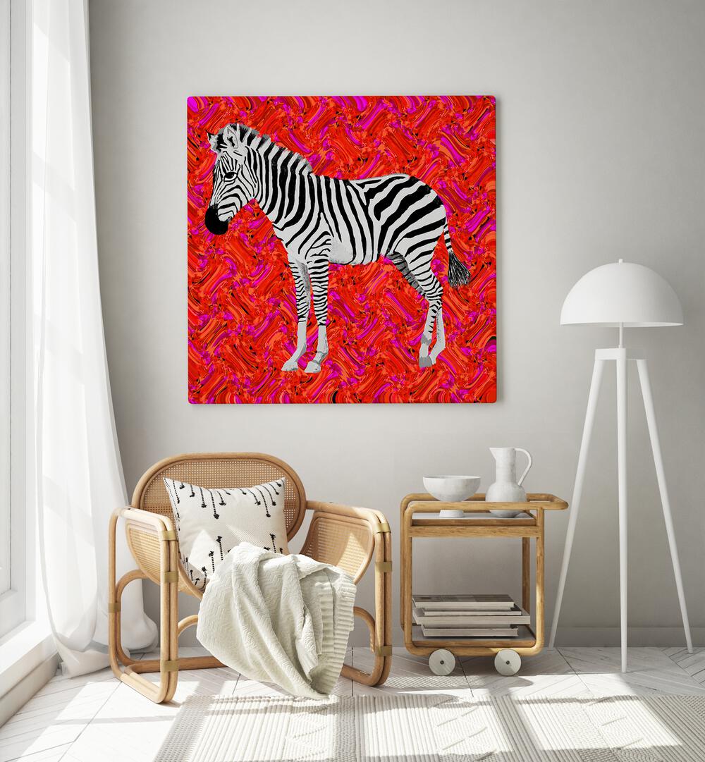 Zebra By Lynnda Rakos Pop Art Paintings Pop Art Prints in Gallery Wrap placed on a wall behind a chair