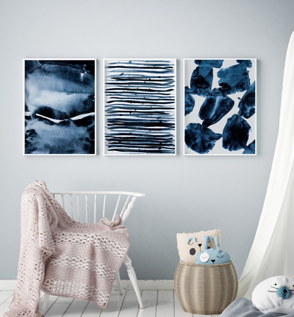 blue abstract brush strokes  set of 3  placed on a wall
