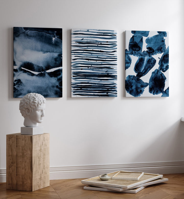 blue abstract brush strokes  set of 3  placed on a wall