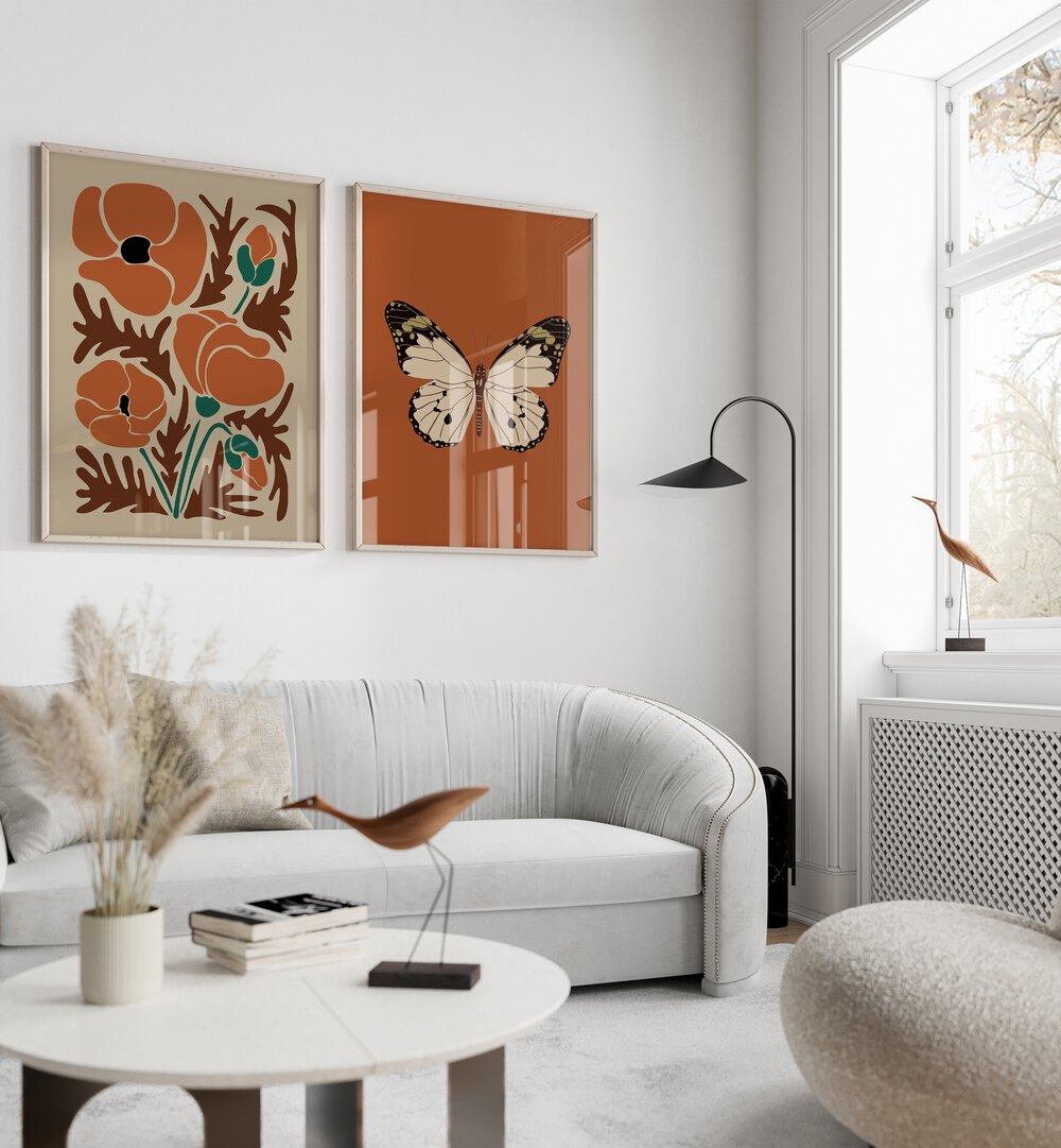 Elegant living room featuring the BUTTERFLY X BOTANICAL, SET OF 2 PAINTINGS, perfect for enhancing home decor.