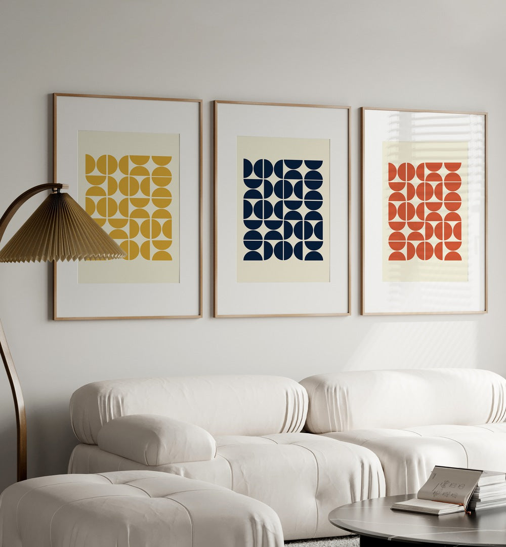 colourful geometric patterns i set of 3  placed on a wall