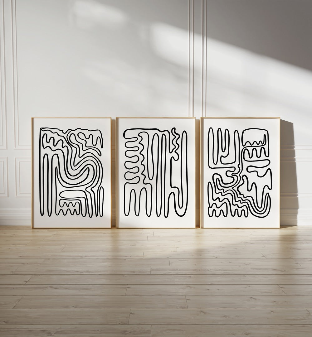 doodle art set of 3  placed on a wall 