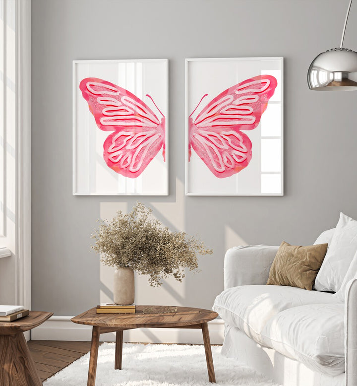 pink butterfly set of 2 Artwork IV placed on a wall