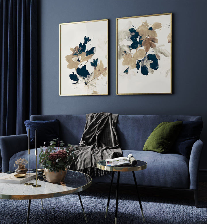 Modern living room with a blue sofa, decorative pillows, and wall art.