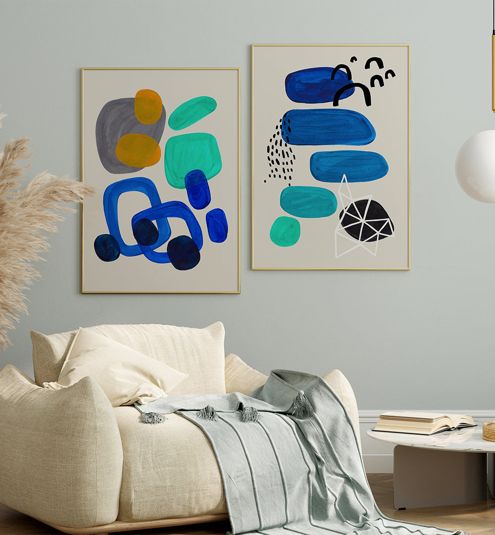 Modern bedroom with abstract art on the wall and a bed with a gray blanket.