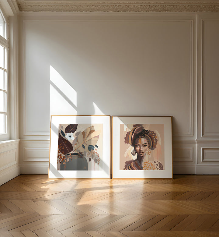 Two framed artworks on a wall with sunlight casting shadows