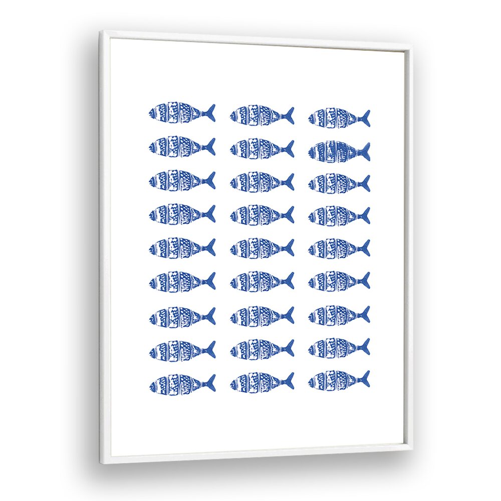 Decorate your space with FISH ROW, BEACH PRINTS featuring a pattern of blue fish in a sleek white frame.